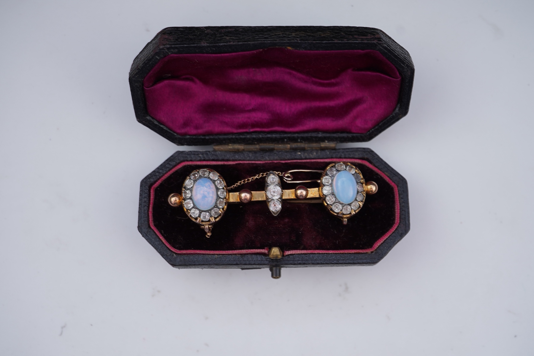 Three rings and a brooch